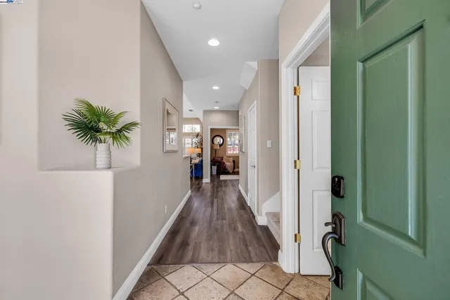 a view of entryway with wooden floor