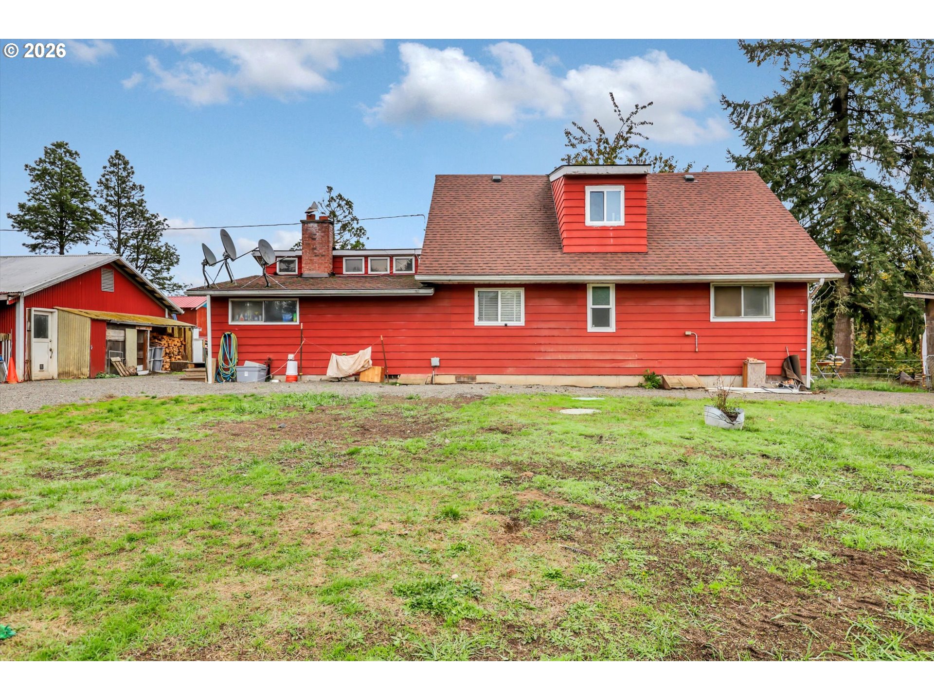 68763 Wasser Road Rainier, OR 97048 - Photo 1 of 34 a front view of house with yard and trees