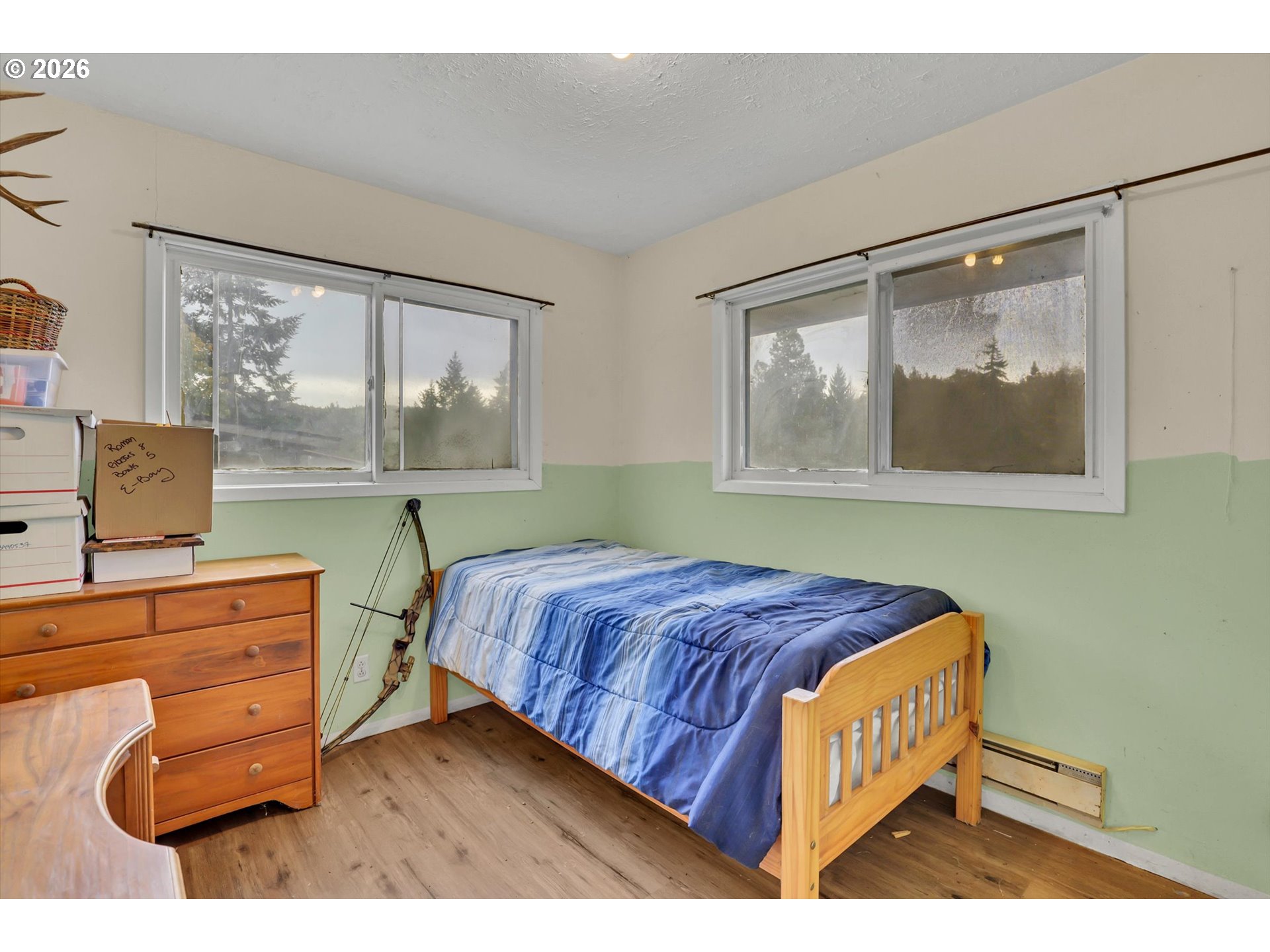 68763 Wasser Road Rainier, OR 97048 - Photo 26 of 34 a bedroom with a bed window and a desk