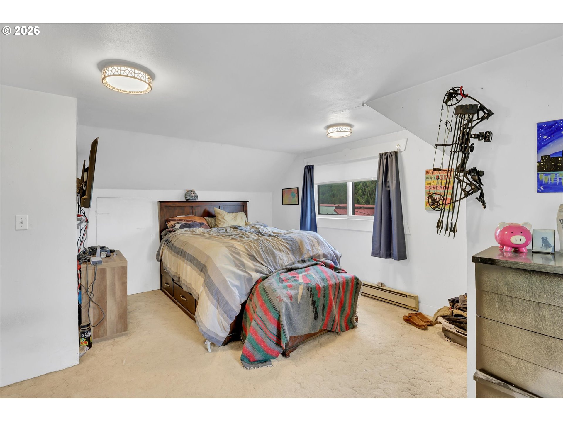 68763 Wasser Road Rainier, OR 97048 - Photo 29 of 34 a bedroom with a bed and a dresser