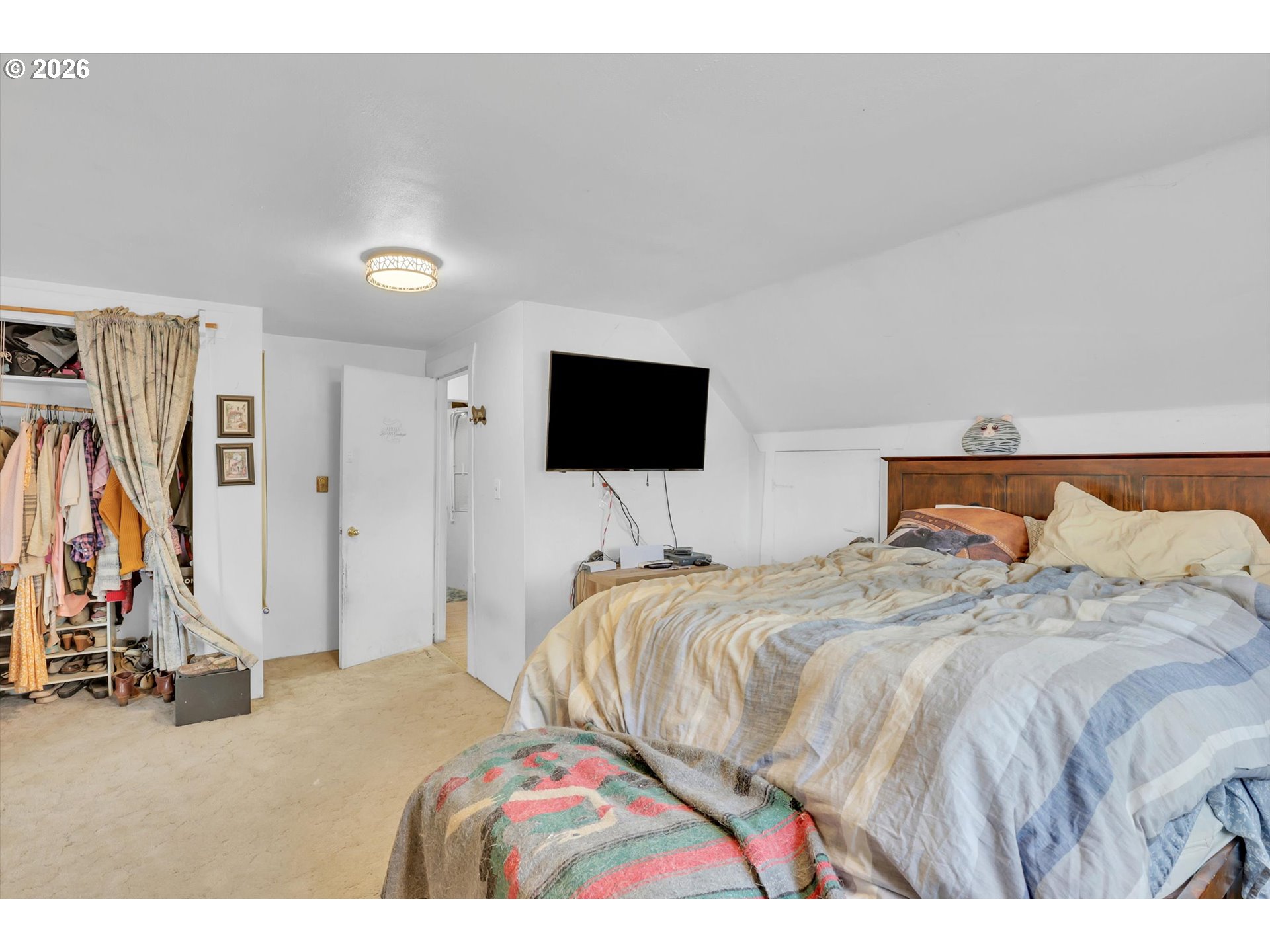 68763 Wasser Road Rainier, OR 97048 - Photo 30 of 34 a bedroom with bed and tv