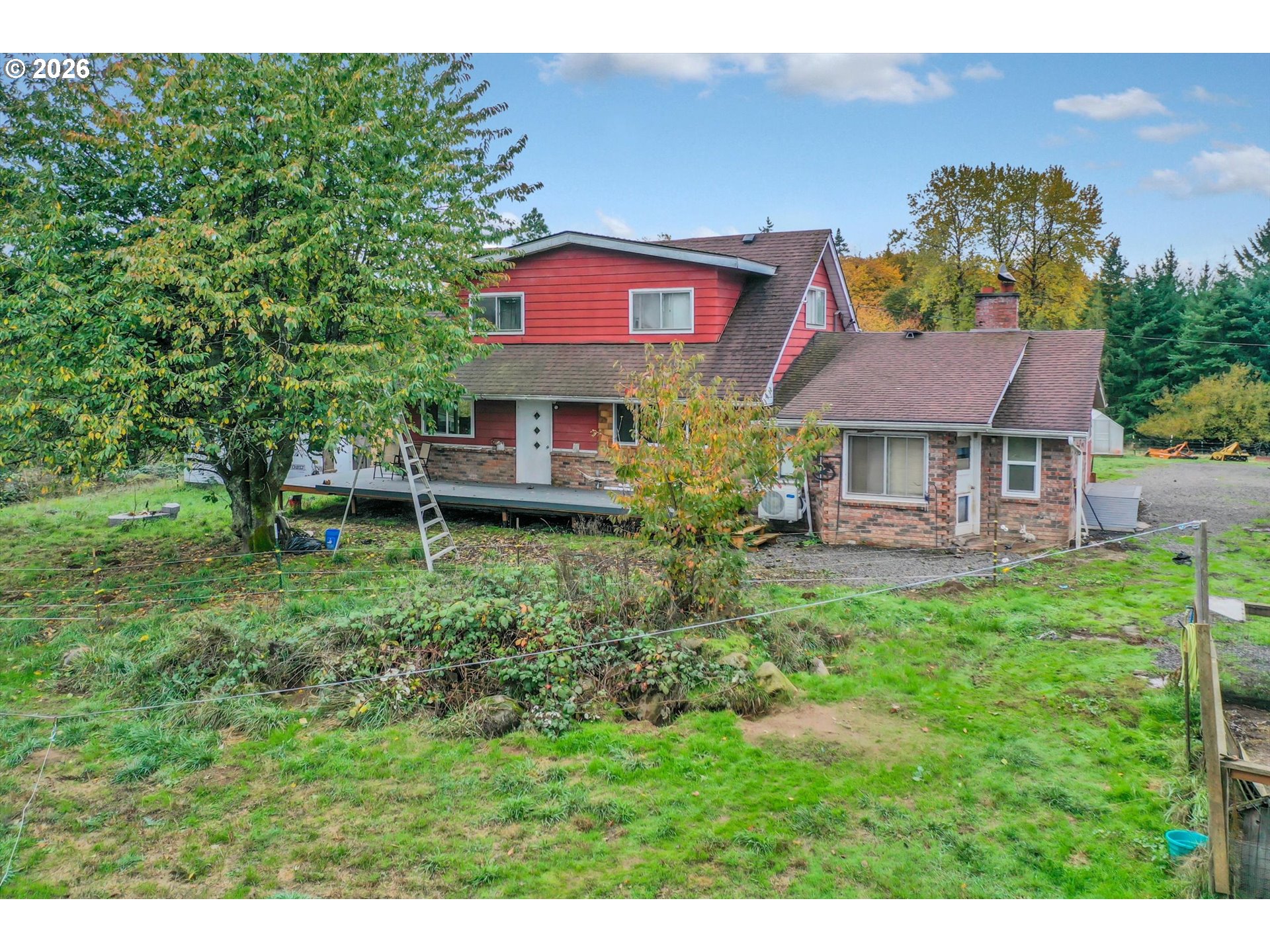 68763 Wasser Road Rainier, OR 97048 - Photo 5 of 34 a front view of a house with a yard