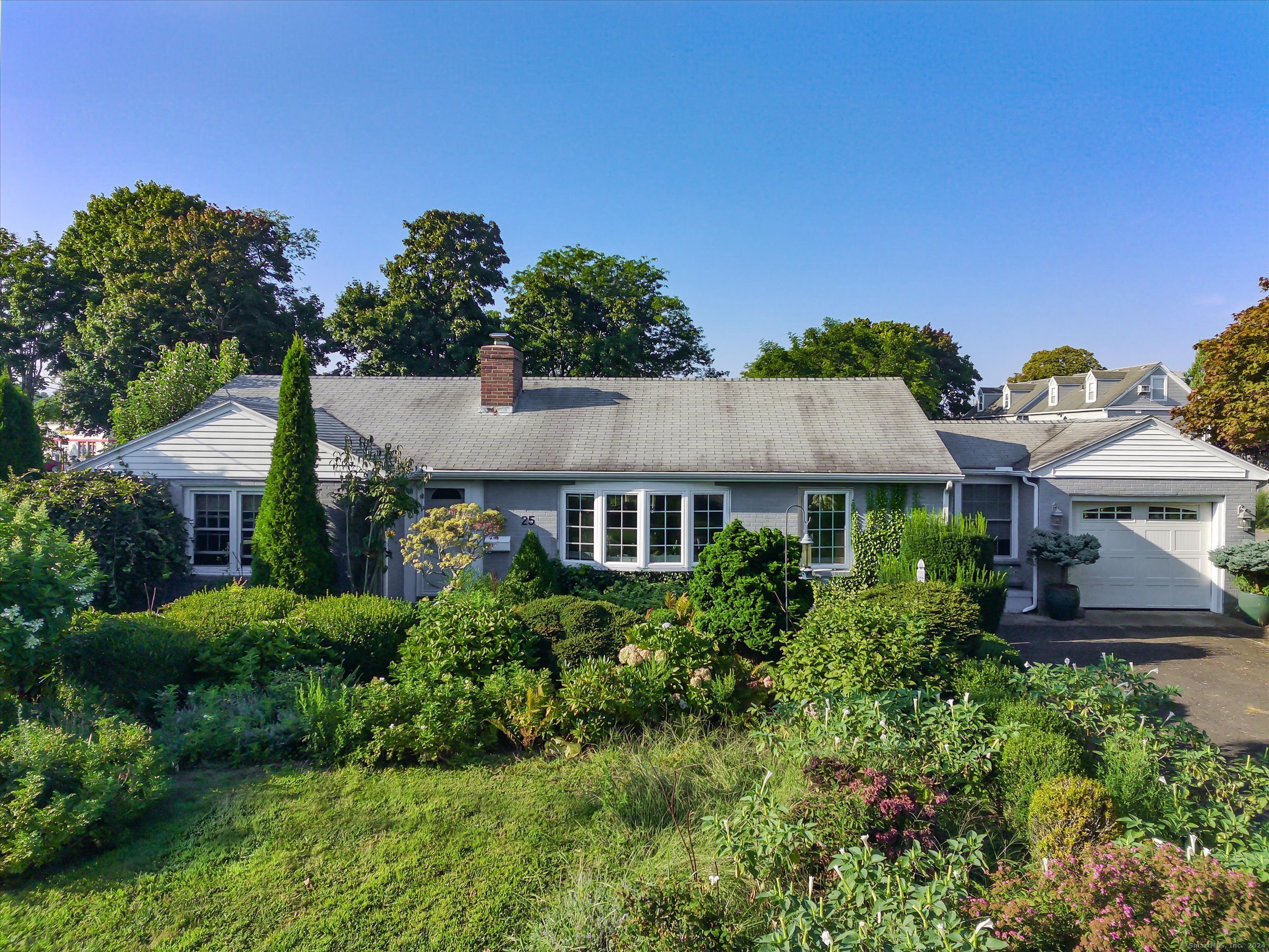 25 Elm Street Old Saybrook, CT 06475 - Photo 1 of 1 front view of a house with a yard