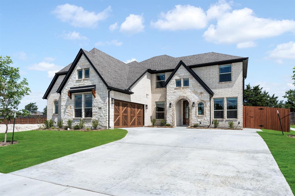 3433 Nightingale Lane Midlothian, TX 76065 - Photo 2 of 40 a front view of house with yard and green space