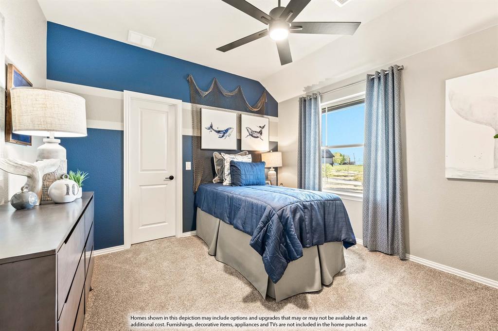 3433 Nightingale Lane Midlothian, TX 76065 - Photo 37 of 40 a bedroom with a bed and a chandelier