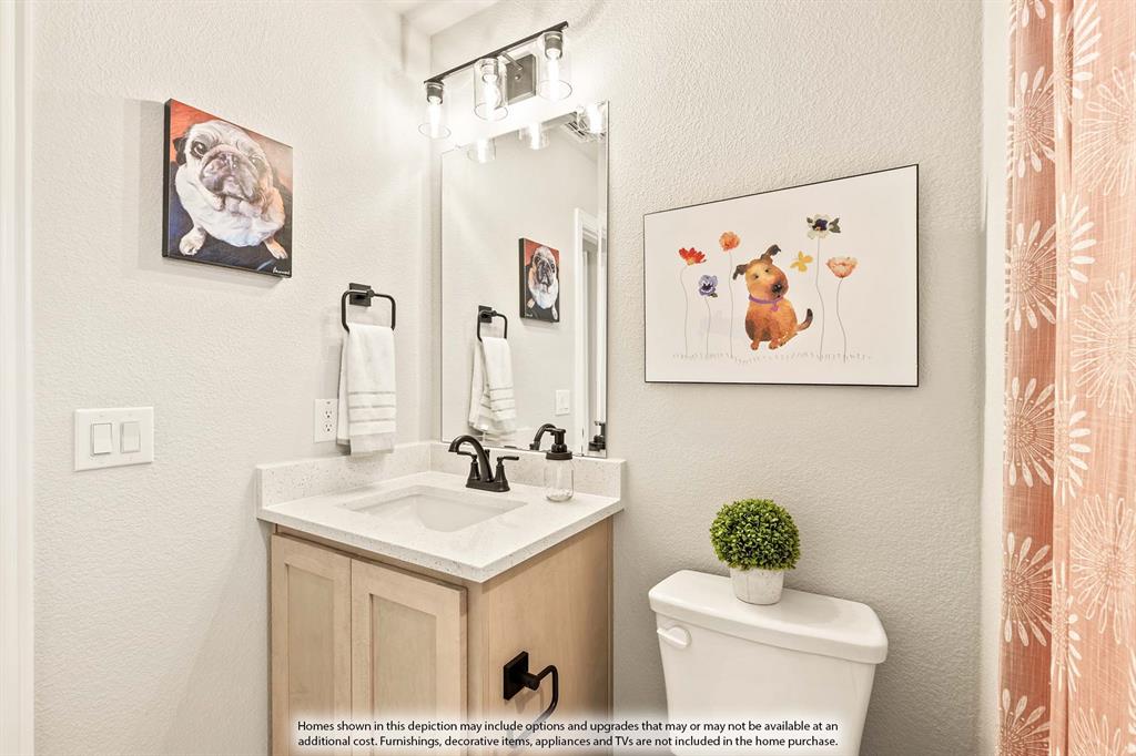 3433 Nightingale Lane Midlothian, TX 76065 - Photo 39 of 40 a bathroom with a sink a mirror and a toilet