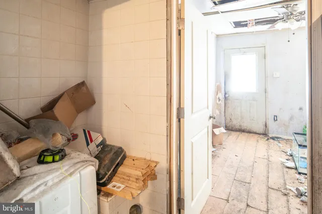 a bathroom with a sink and shower