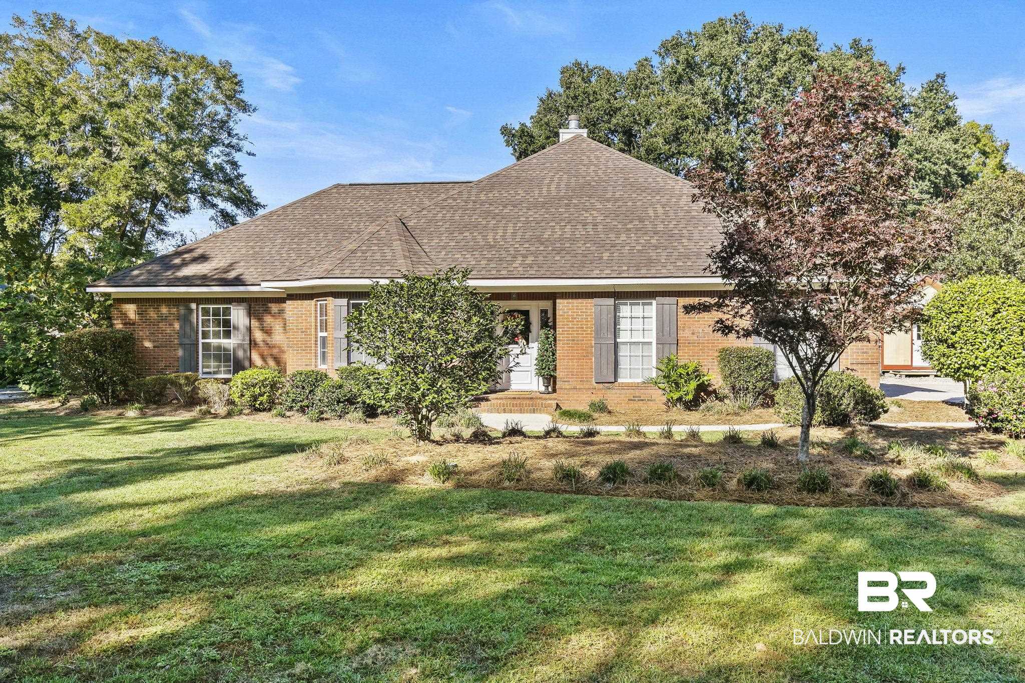 9631 Bay Meadows Avenue Fairhope, AL 36532 - Photo 1 of 49 View of front facade with a front lawn