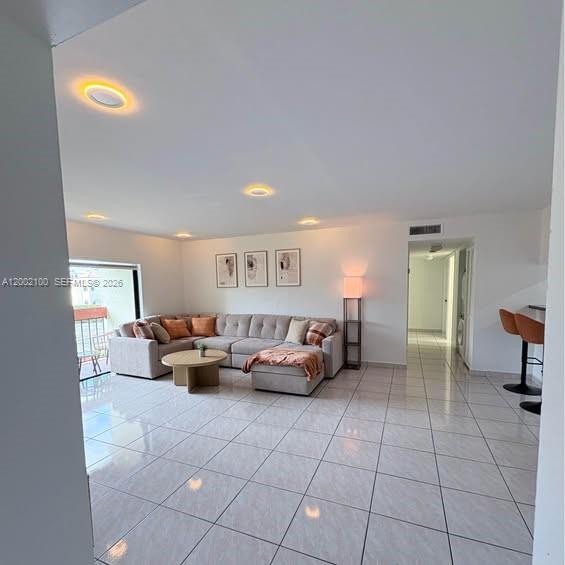 8650 Southwest 149th Avenue, Unit 310 Miami, FL 33193 - Photo 2 of 16 a living room with furniture and a window
