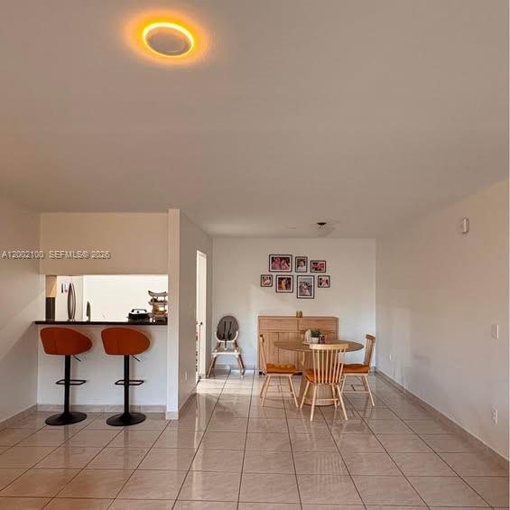 8650 Southwest 149th Avenue, Unit 310 Miami, FL 33193 - Photo 4 of 16 a workspace with furniture