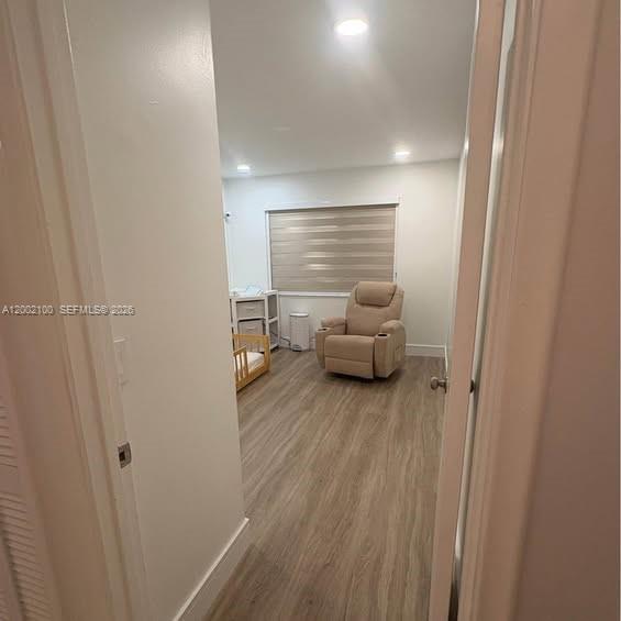 8650 Southwest 149th Avenue, Unit 310 Miami, FL 33193 - Photo 7 of 16 a living room with furniture and a wooden floor