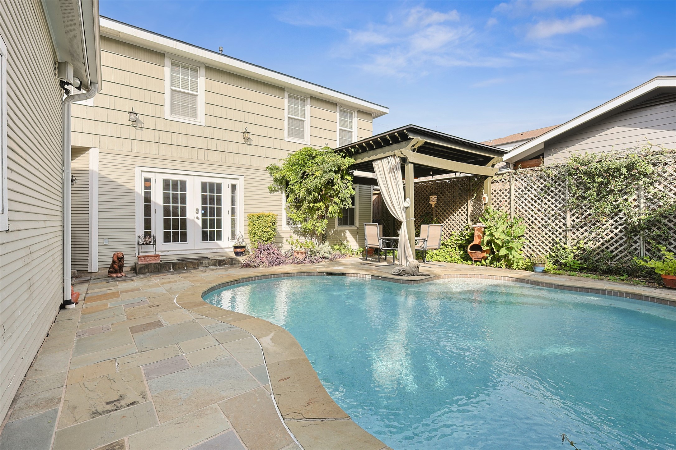 1311 Peden Street Houston, TX 77006 - Photo 20 of 21 a view of a house with pool and sitting area