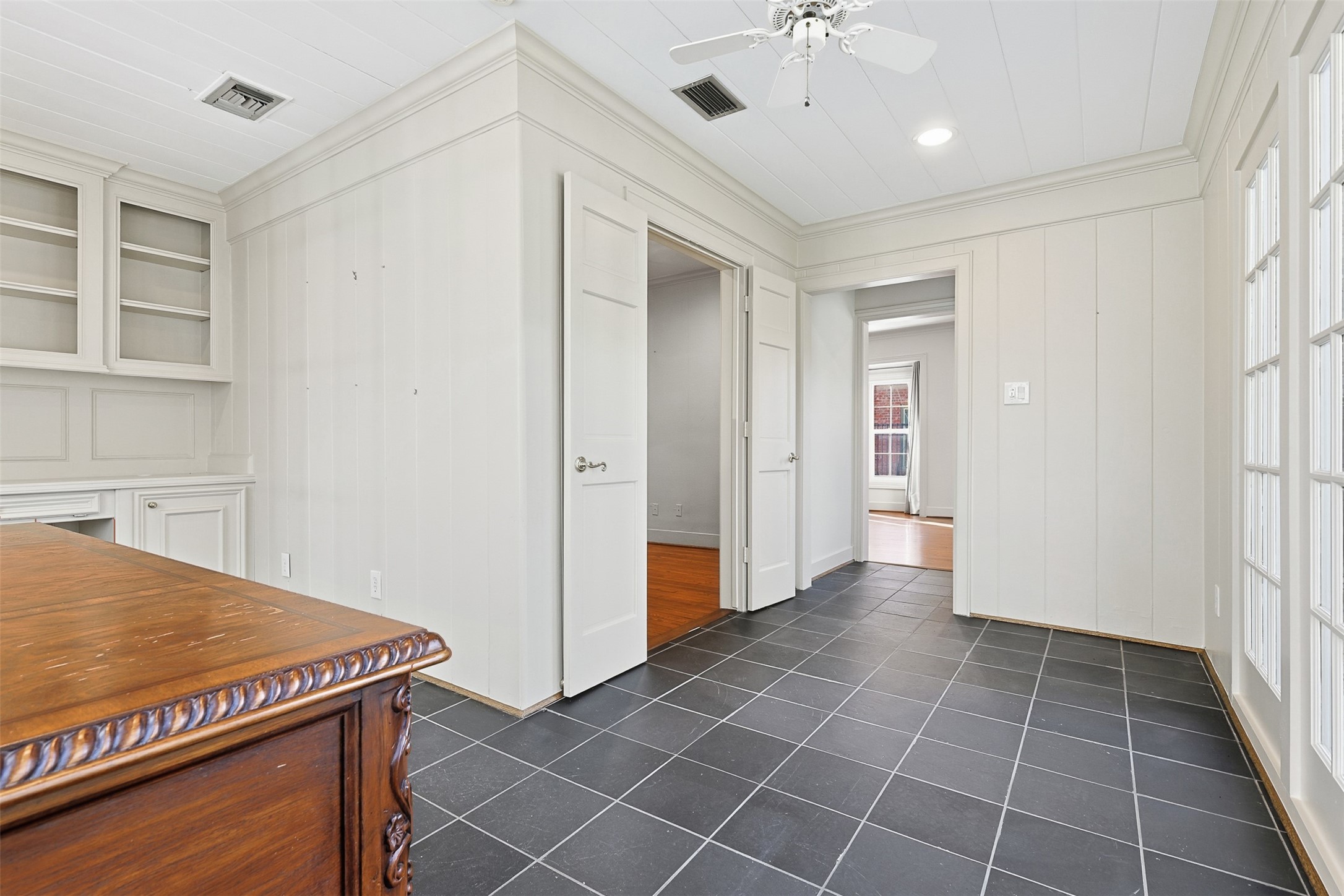 1311 Peden Street Houston, TX 77006 - Photo 4 of 21 a view of a kitchen with a sink and a refrigerator