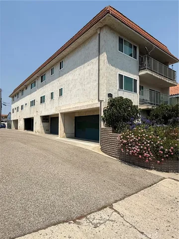 a front view of house along with street