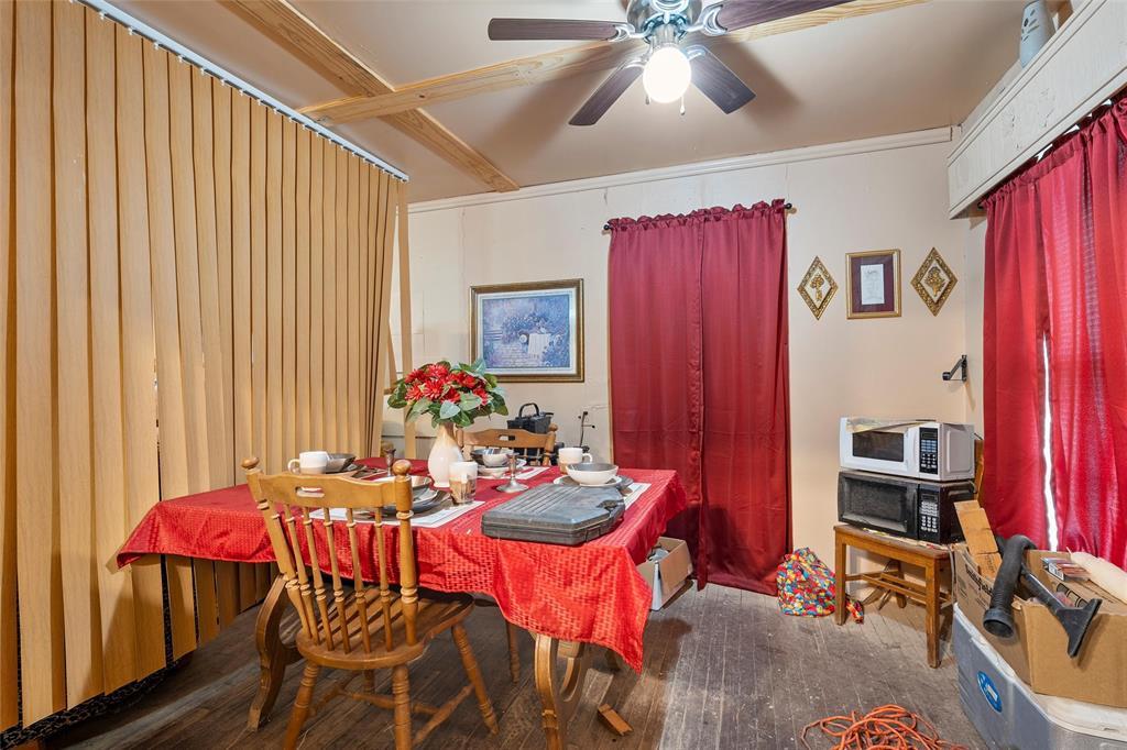416 Capps Street Marlin, TX 76661 - Photo 21 of 25 a dining room with furniture and window