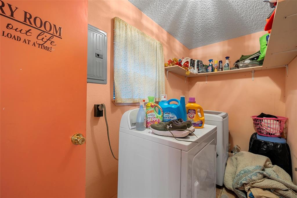 416 Capps Street Marlin, TX 76661 - Photo 8 of 25 a dining room with furniture and wooden floor