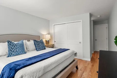 a bed room with a bed and a couch