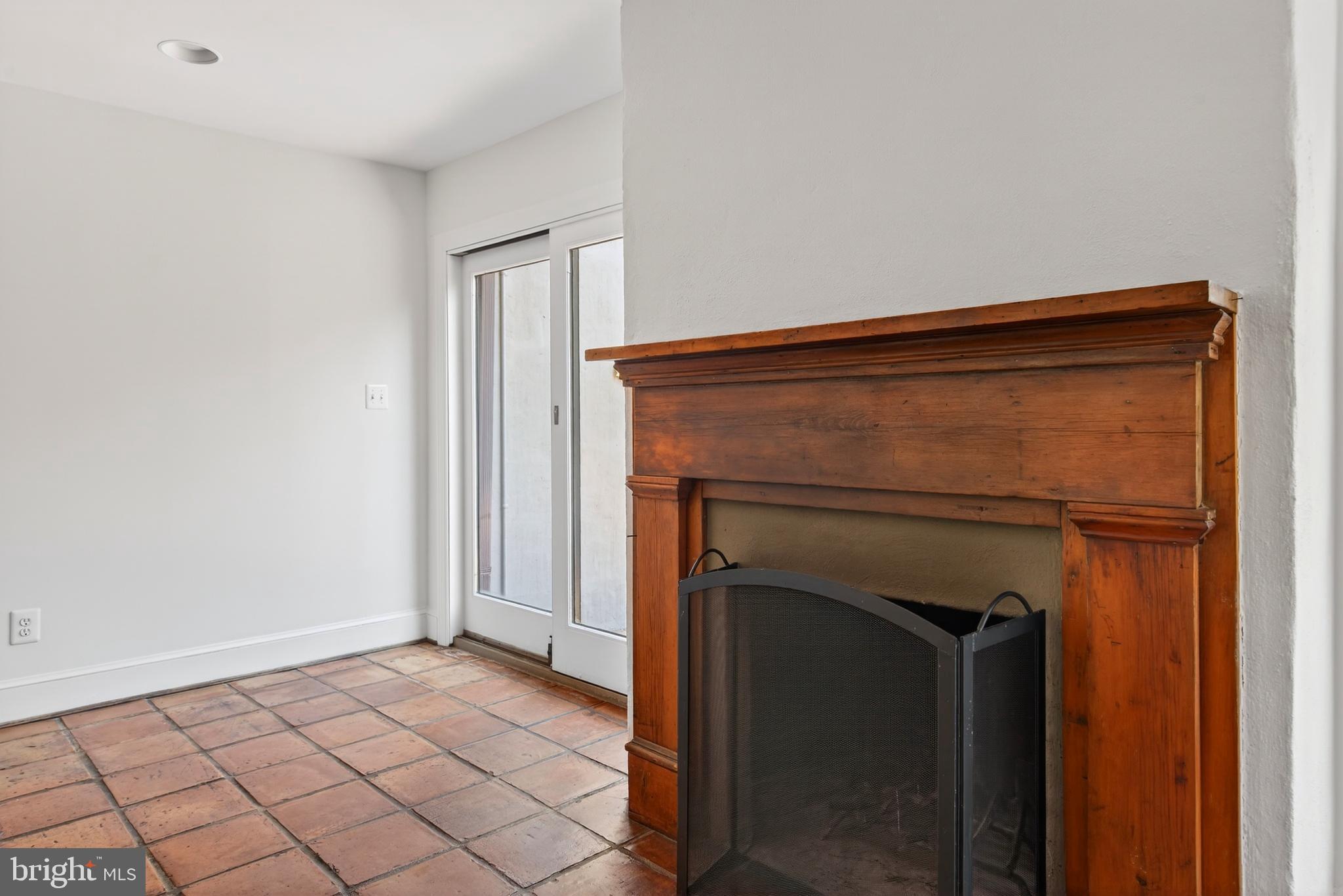 306 9th Street Southeast Washington, DC 20003 - Photo 18 of 50 a view of a livingroom and a fireplace