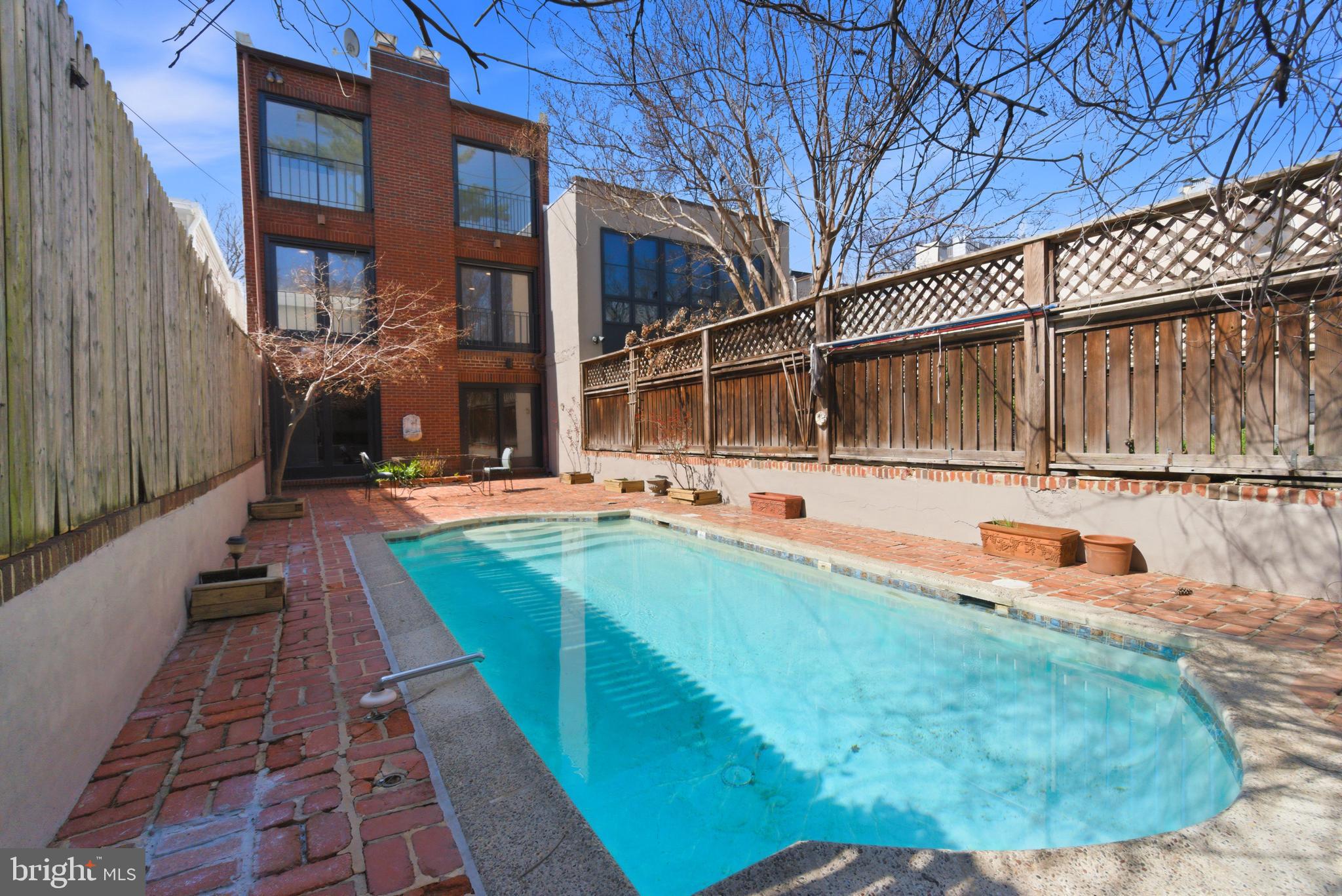 306 9th Street Southeast Washington, DC 20003 - Photo 20 of 50 a view of a house with backyard and sitting area