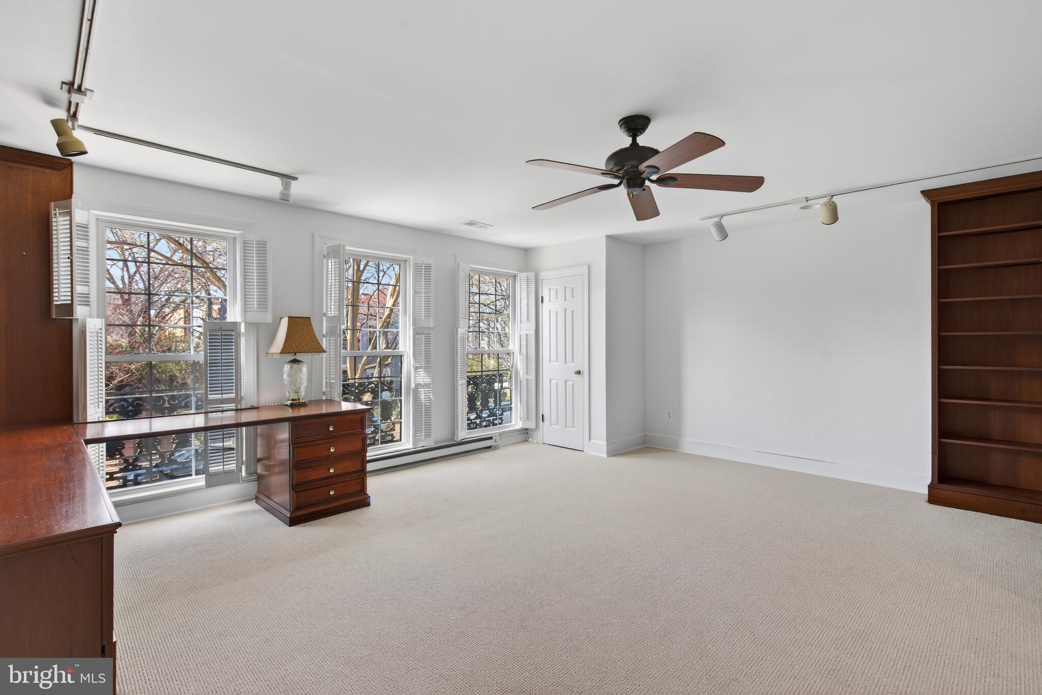 306 9th Street Southeast Washington, DC 20003 - Photo 31 of 50 a living room with furniture windows and a ceiling fan