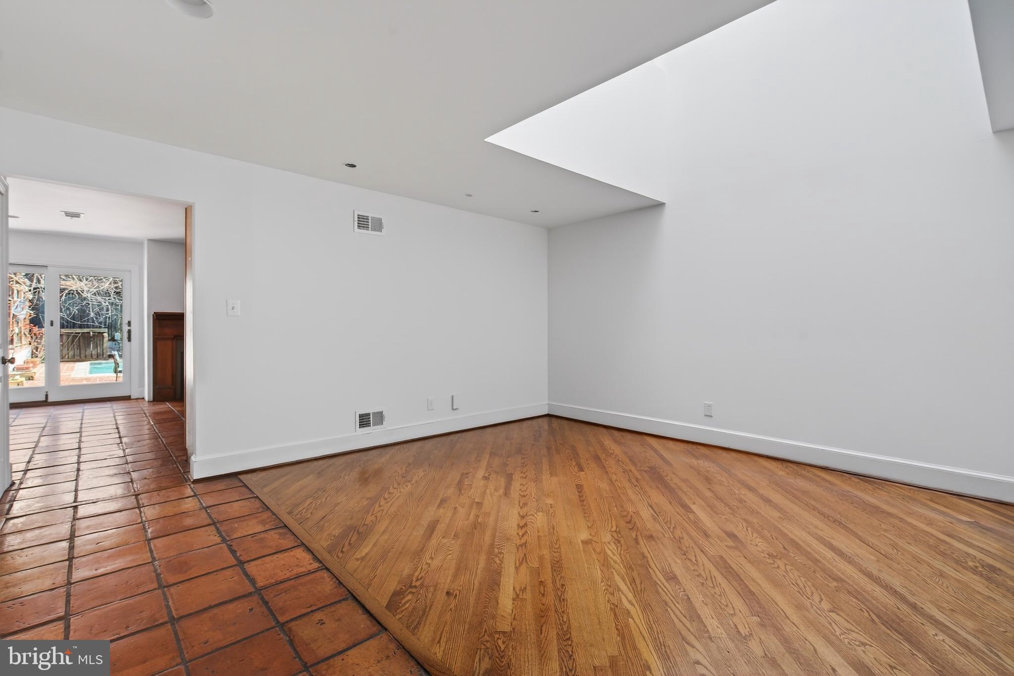 306 9th Street Southeast Washington, DC 20003 - Photo 9 of 50 a view of a room with wooden floor