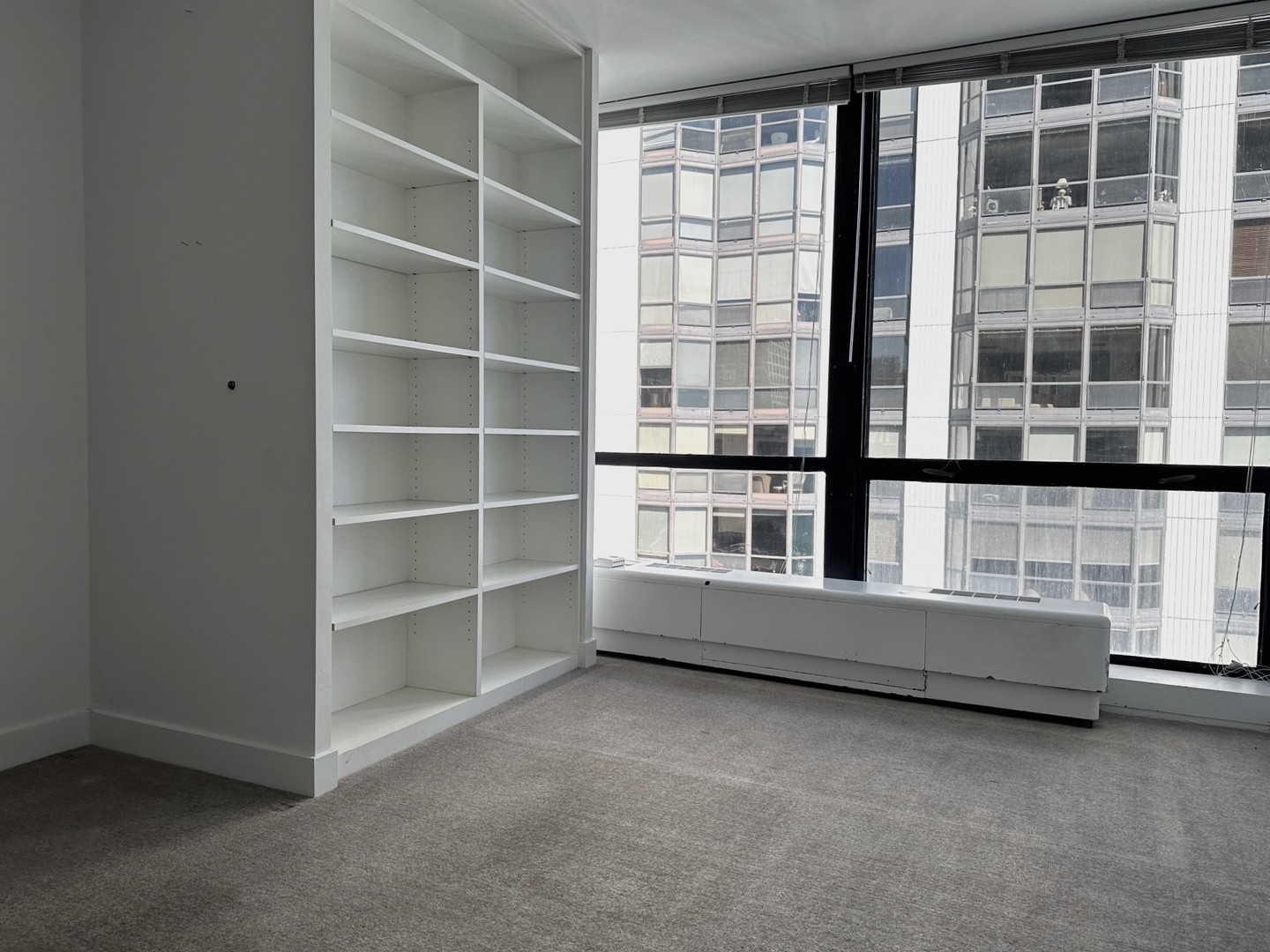 910 North Lake Shore Drive, Unit 2220 Chicago, IL 60611 - Photo 17 of 21 a view of an empty room with a window