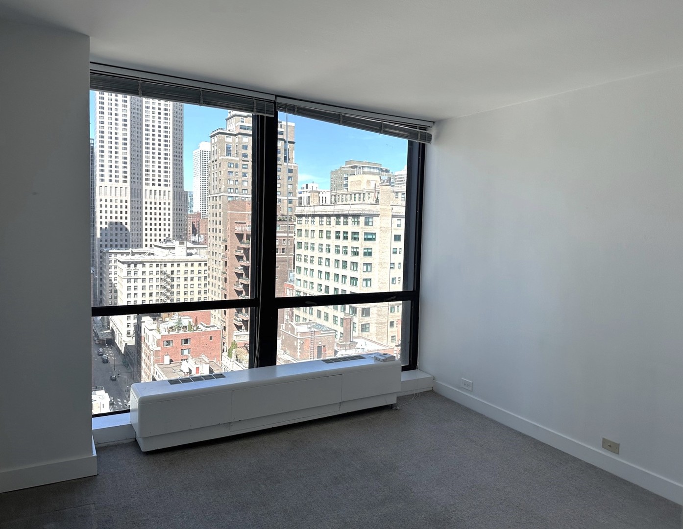 910 North Lake Shore Drive, Unit 2220 Chicago, IL 60611 - Photo 20 of 21 an empty room with large window