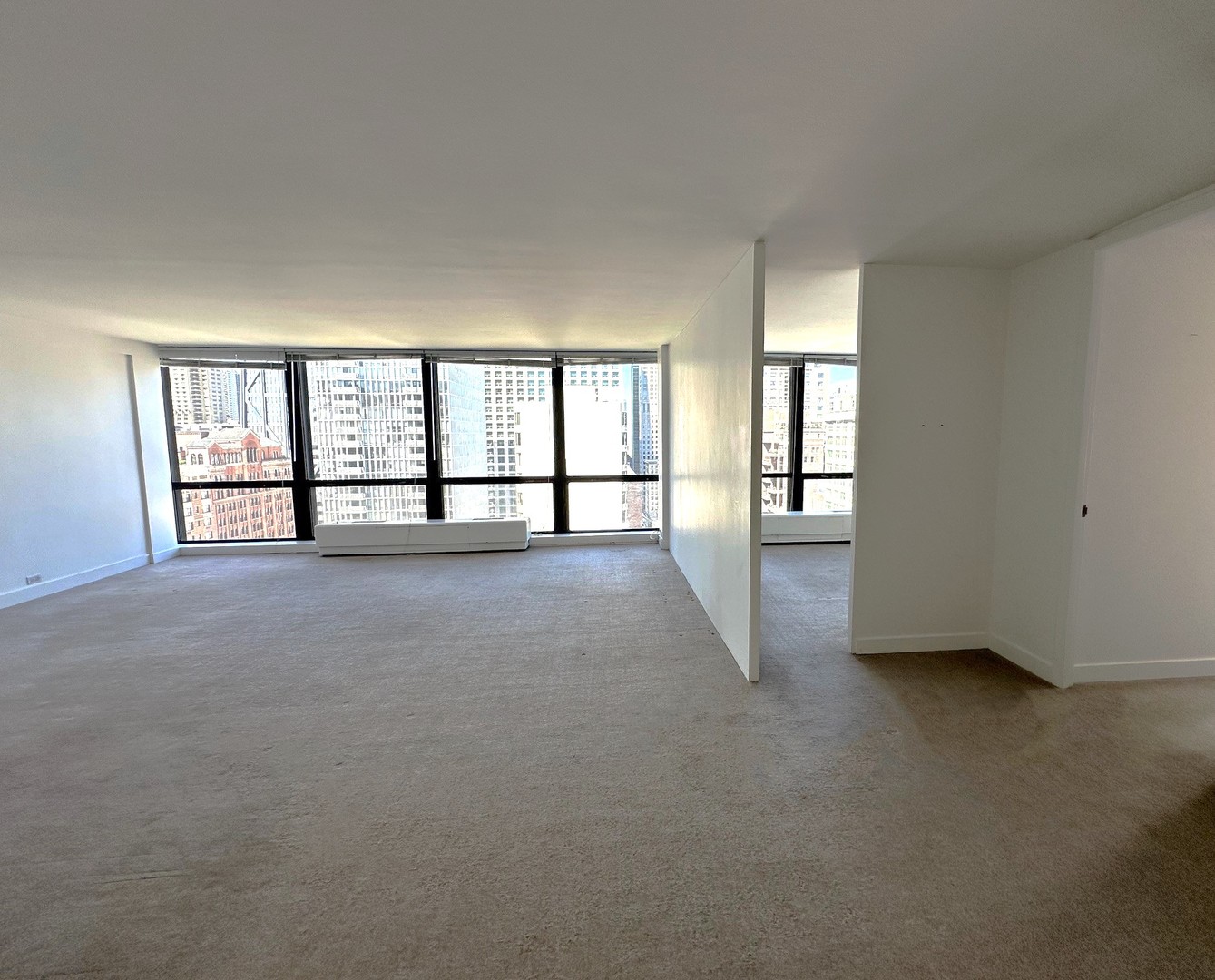 910 North Lake Shore Drive, Unit 2220 Chicago, IL 60611 - Photo 5 of 21 a view of an empty room with a window