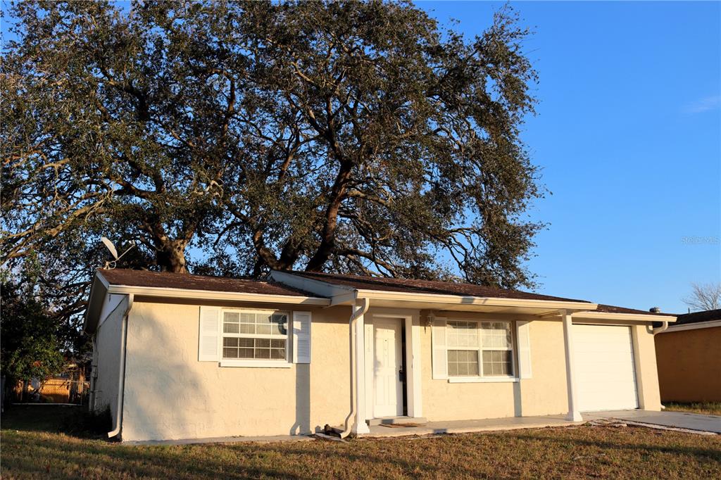 9116 Chantilly Lane Port Richey, FL 34668 - Photo 1 of 30 Front View
