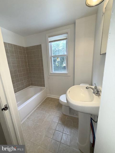 728 Oak Way Havertown, PA 19083 - Photo 11 of 26 a bathroom with a sink a toilet and shower