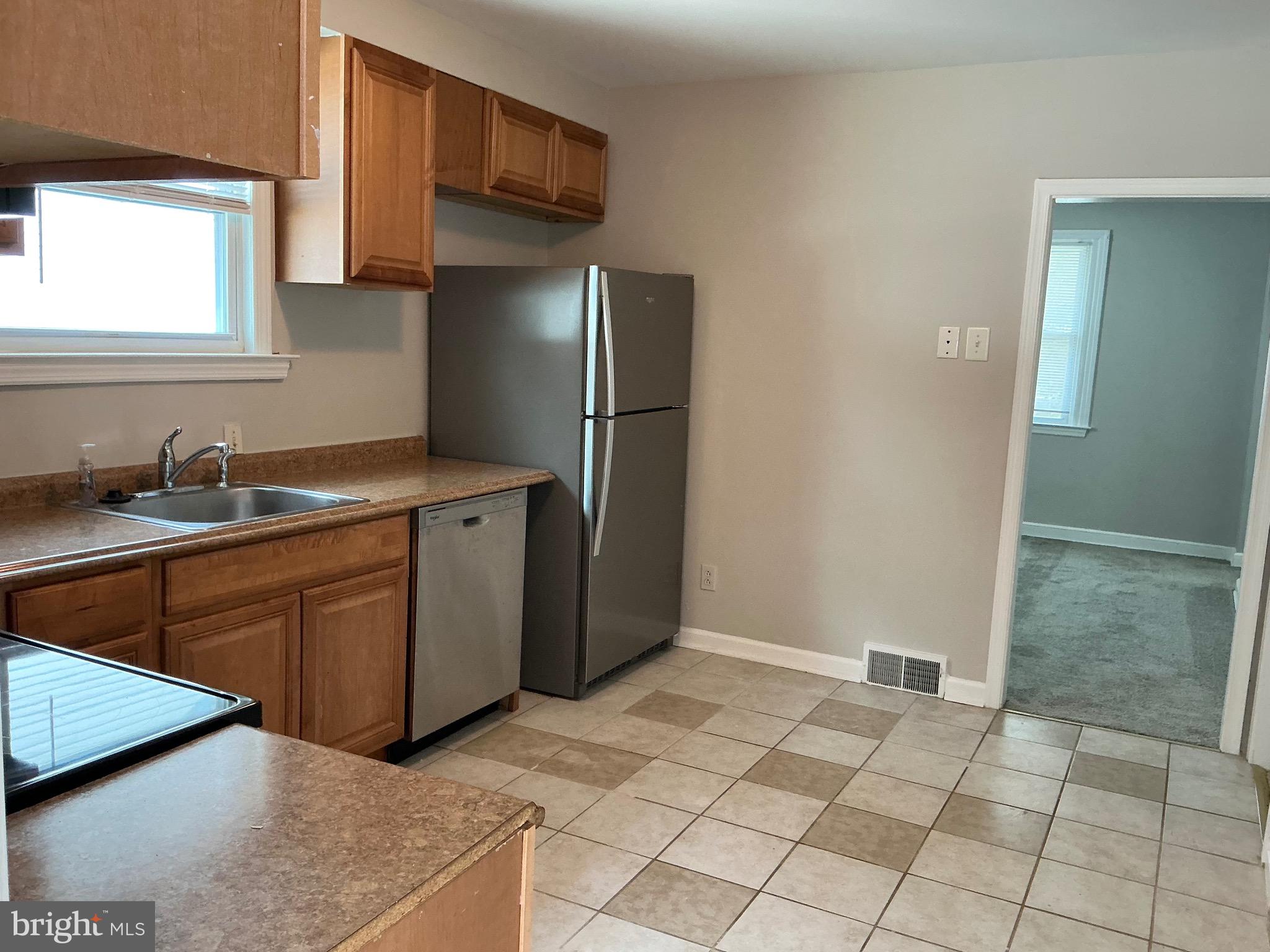728 Oak Way Havertown, PA 19083 - Photo 5 of 26 a kitchen with stainless steel appliances granite countertop a refrigerator and a sink