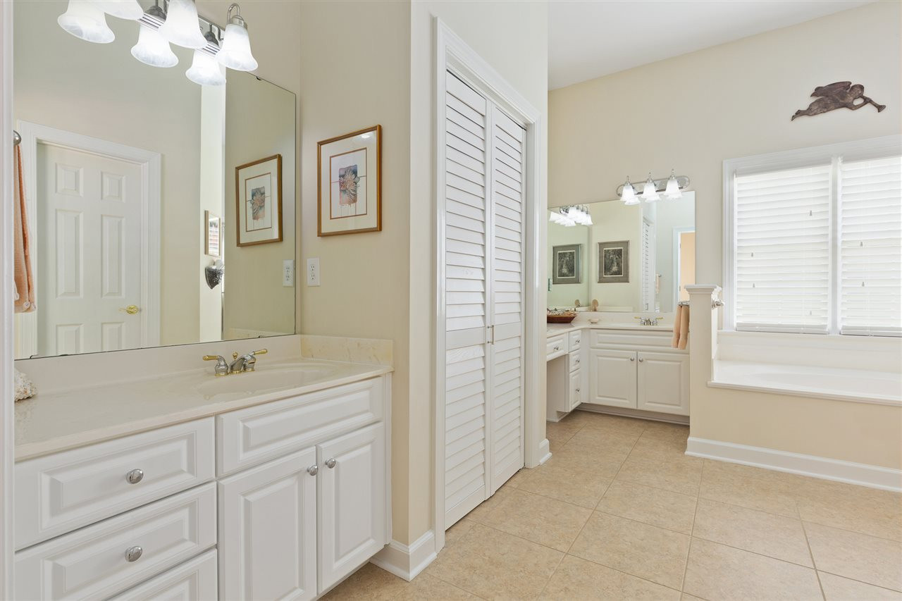 4008 Batiste Road Raleigh, NC 27613 - Photo 16 of 24 This bathroom has been updated with a new shower, new lights, new fixtures, and toilet.Also has new flooring Master Bath/Spa