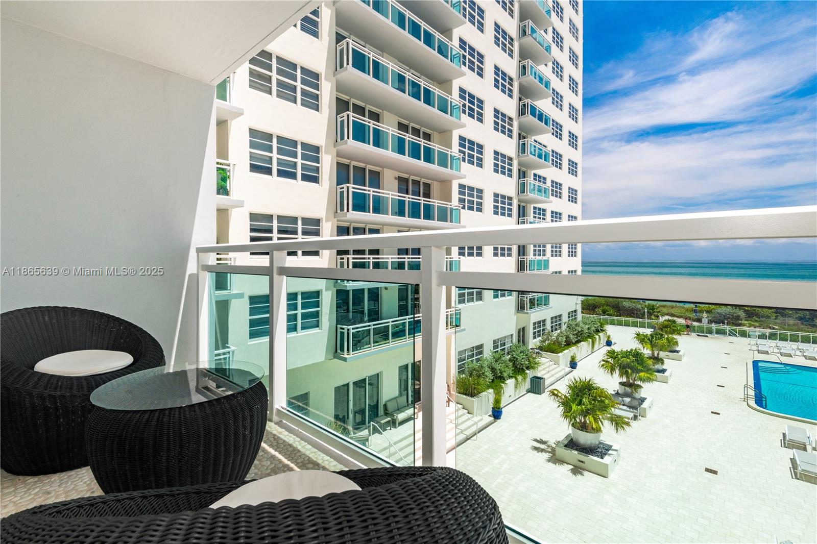 6917 Collins Avenue, Unit 511 Miami Beach, FL 33141 - Photo 6 of 24 a view of balcony with couch