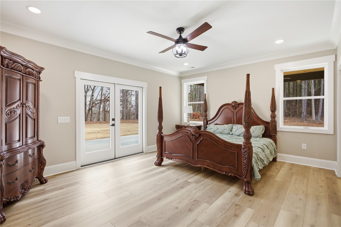 147 McAlister Road West Union, SC 29696 - Photo 13 of 49 This spacious bedroom offers serene views and comfortable living.