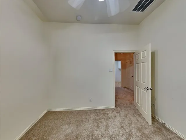 a view of a window in an empty room