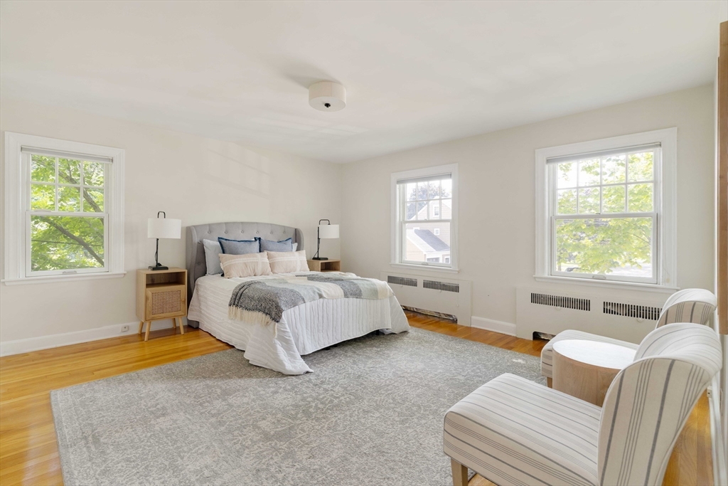 52 St Mary's Road Milton, MA 02186 - Photo 16 of 32 a bed room with a bed and a couch