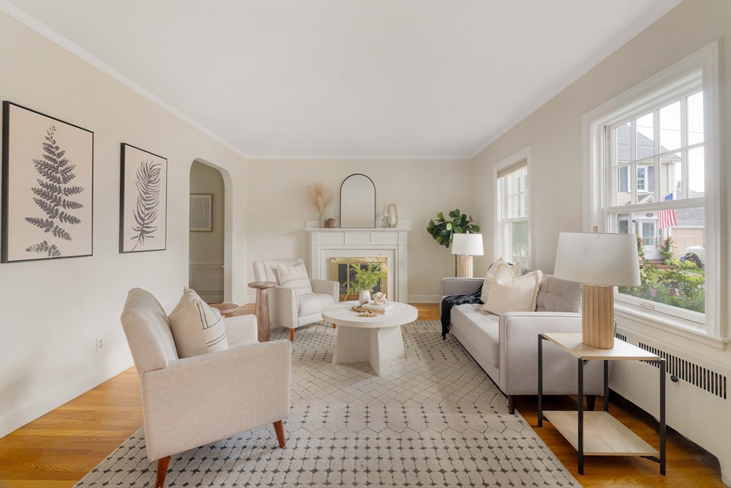 52 St Mary's Road Milton, MA 02186 - Photo 3 of 32 a living room with furniture and a wooden floor