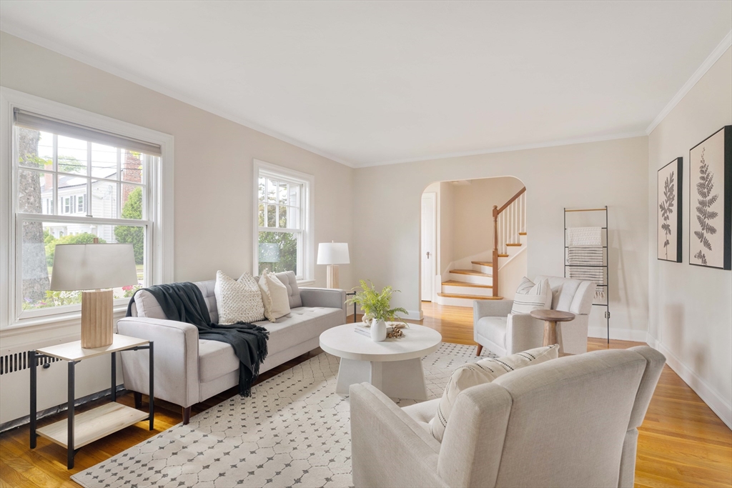 52 St Mary's Road Milton, MA 02186 - Photo 6 of 32 a living room with furniture and a large window