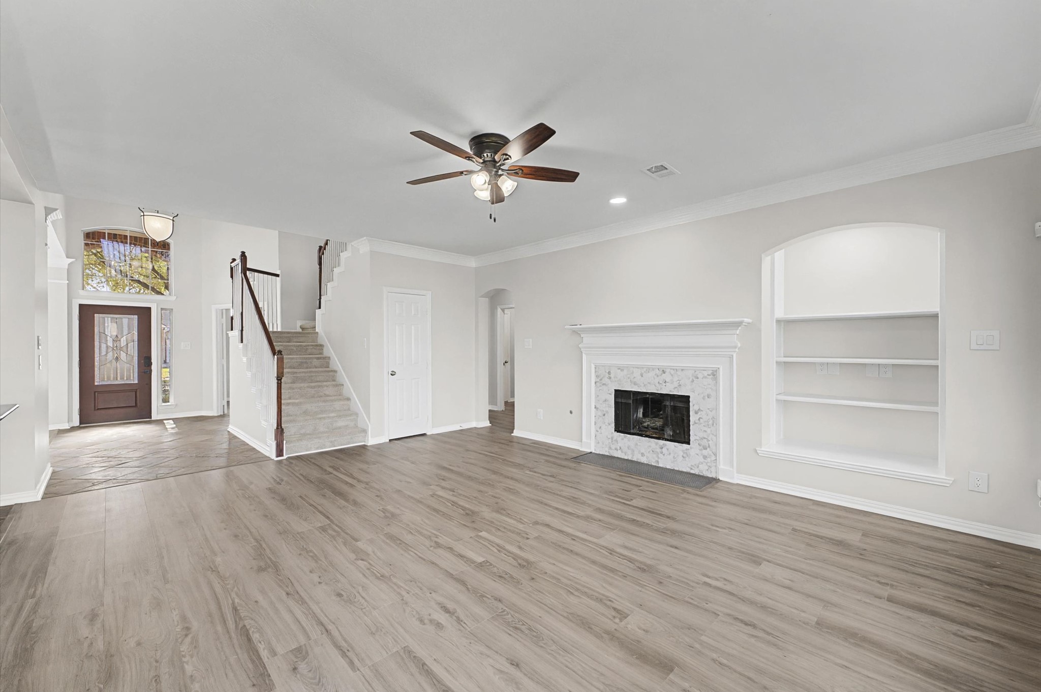 15442 Bay Tree Landing Cypress, TX 77429 - Photo 15 of 46 Ideal living room with all new flooring, a nicely located staircase, extra storage closet. Ready for family events & holidays!