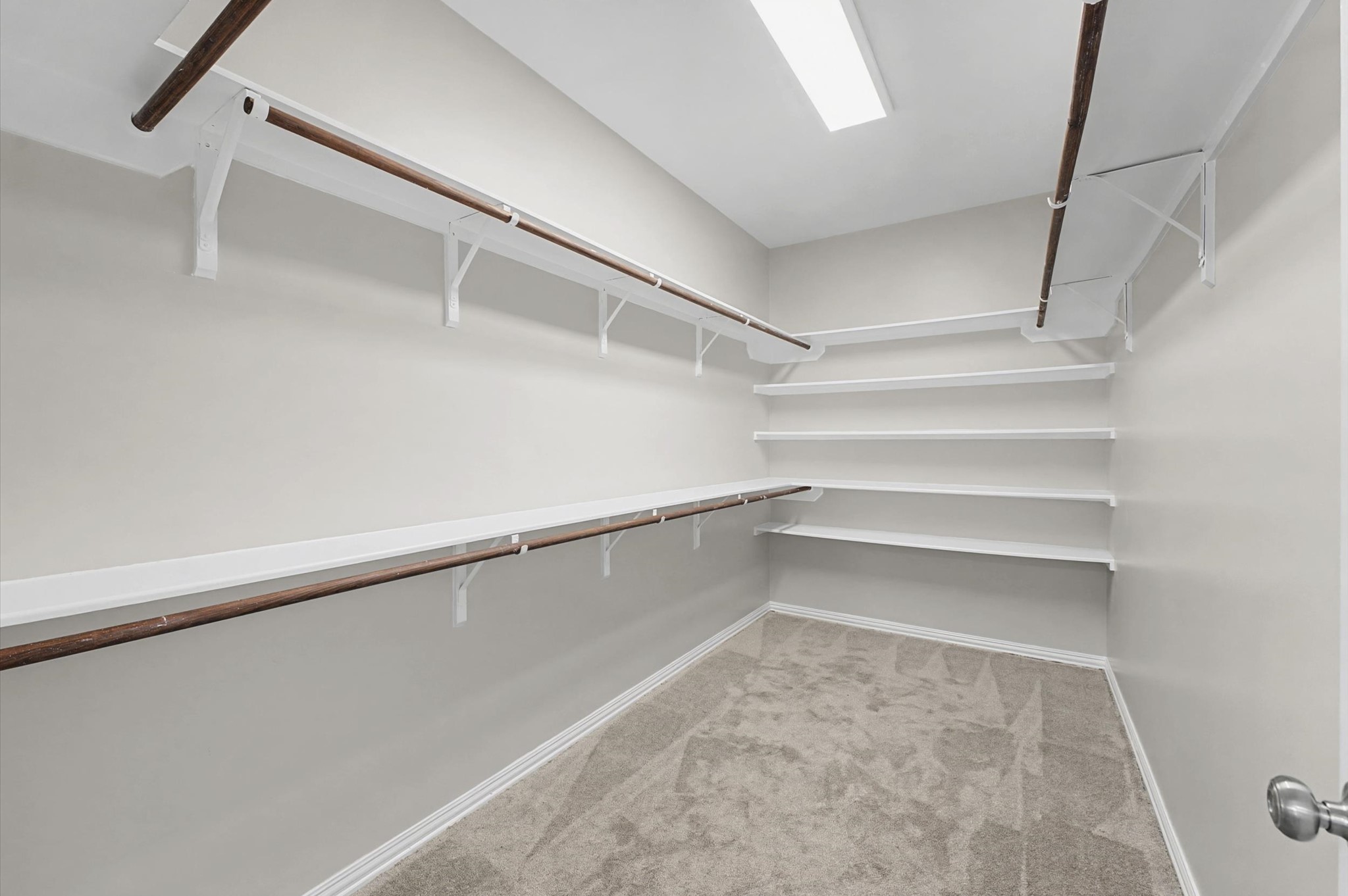 15442 Bay Tree Landing Cypress, TX 77429 - Photo 26 of 46 Huge walk-in closet for the Primary Suite. Built-in shelving ensuring plenty of room for both!