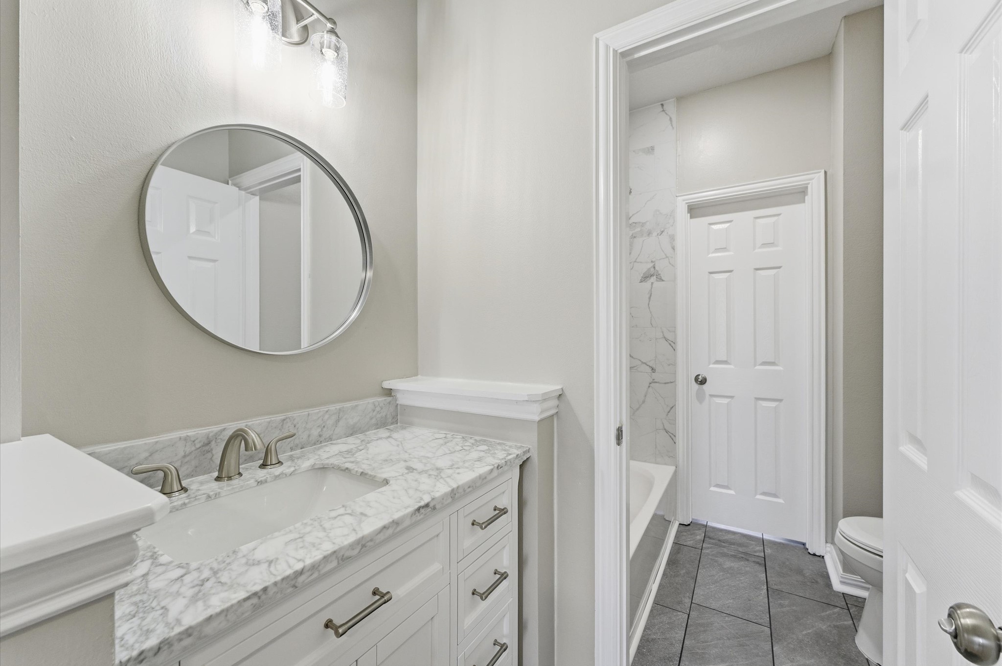 15442 Bay Tree Landing Cypress, TX 77429 - Photo 33 of 46 This Jack & Jill concept provides a split layout offering private mirrors & sinks on opposite sides.