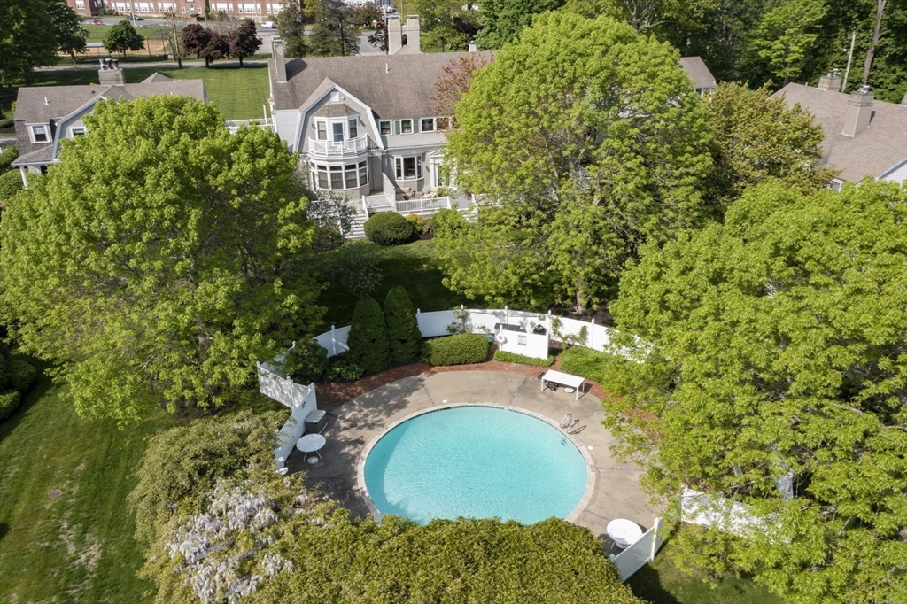 74 Branch Street, Unit 15 Scituate, MA 02066 - Photo 24 of 26 an aerial view of a house with yard swimming pool and outdoor seating