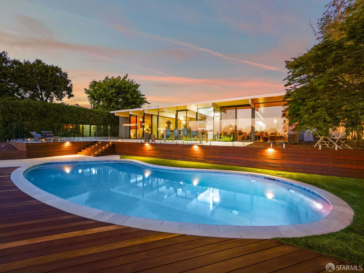 5664 Greenridge Road Castro Valley, CA 94552 - Photo 1 of 59 a view of a swimming pool with an outdoor space and seating area