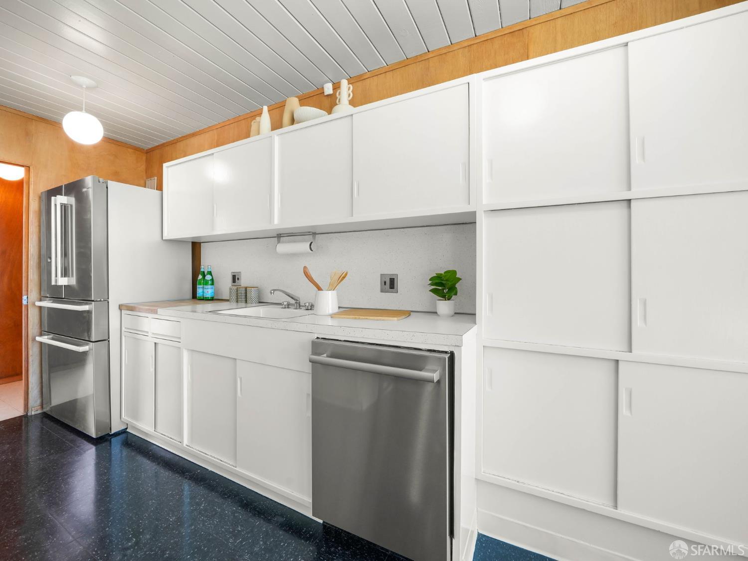 5664 Greenridge Road Castro Valley, CA 94552 - Photo 11 of 59 a kitchen with stainless steel appliances a refrigerator sink and cabinets