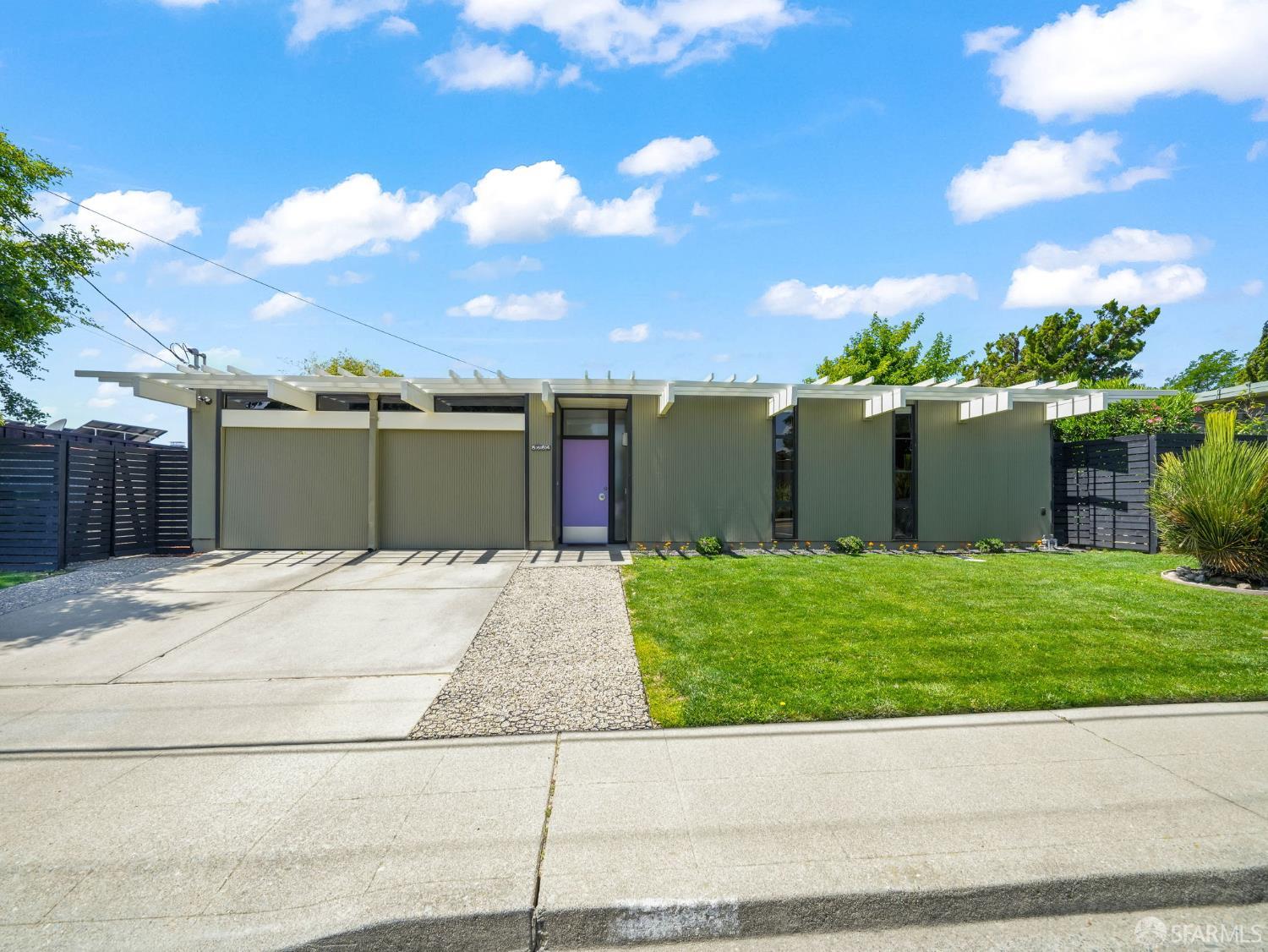 5664 Greenridge Road Castro Valley, CA 94552 - Photo 2 of 59 a front view of a house with a garden and yard
