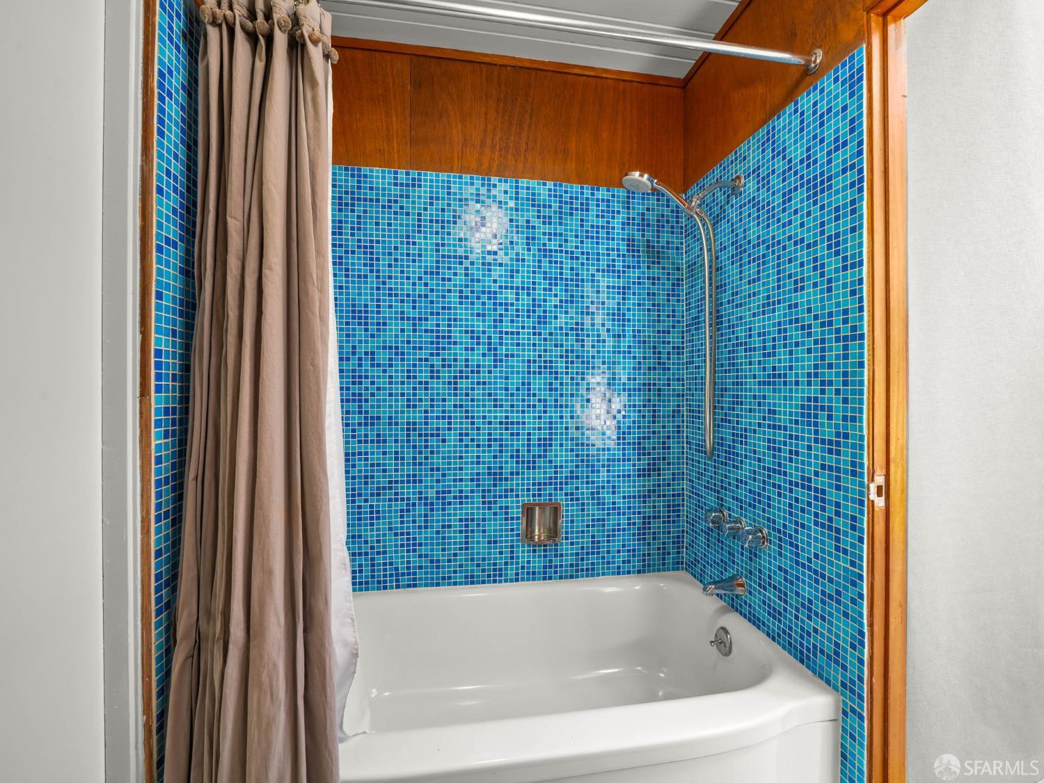 5664 Greenridge Road Castro Valley, CA 94552 - Photo 29 of 59 a bathroom with a bathtub and a shower