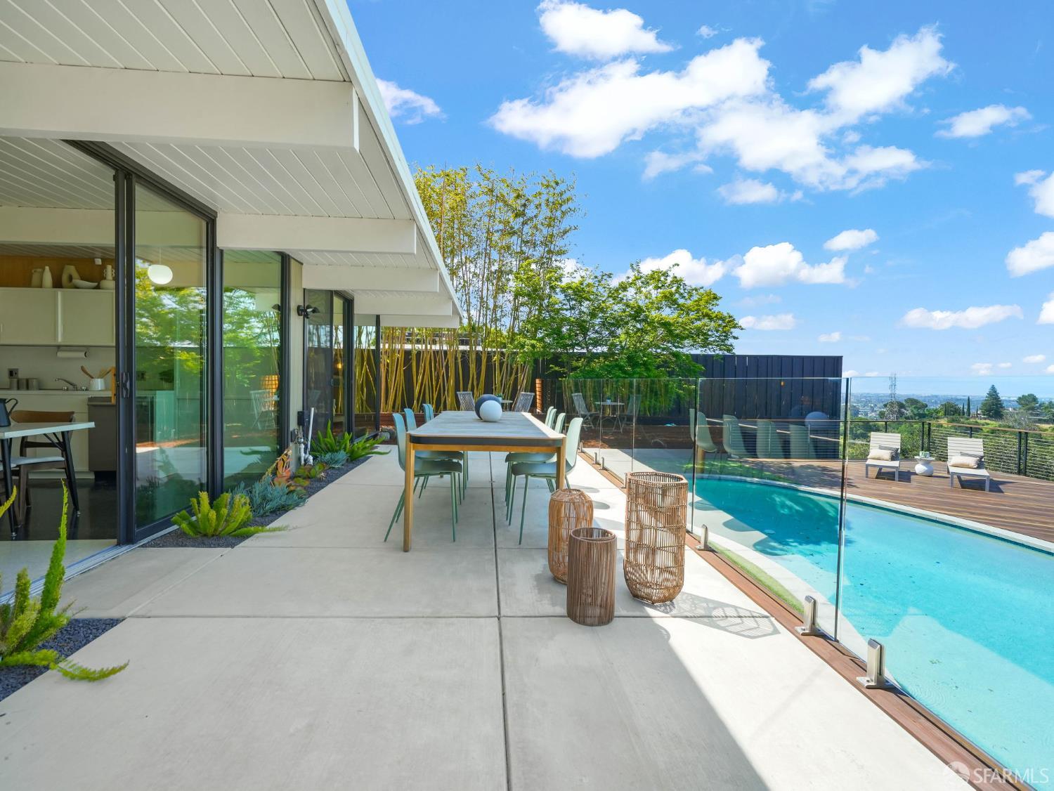 5664 Greenridge Road Castro Valley, CA 94552 - Photo 37 of 59 a view of a patio with a table and chairs