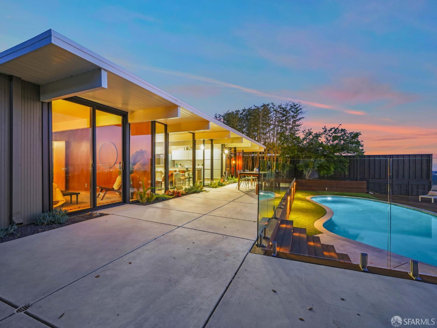5664 Greenridge Road Castro Valley, CA 94552 - Photo 47 of 59 a view of a swimming pool with a lounge chairs