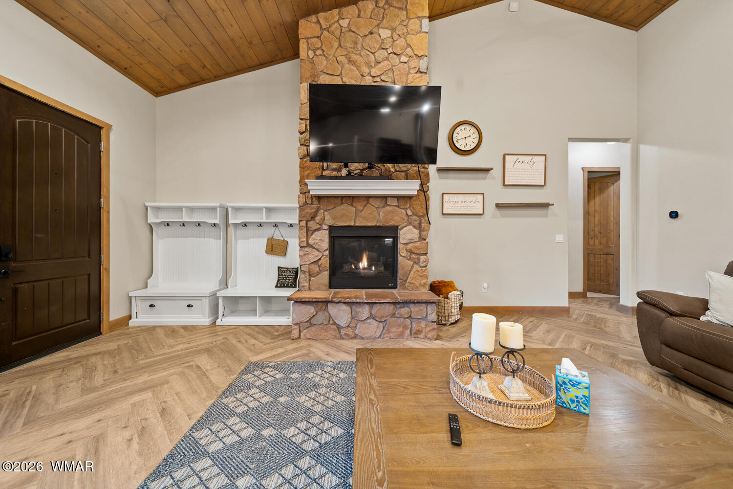 3360 West Blazingstar Road Show Low, AZ 85901 - Photo 31 of 71 a living room with furniture a flat screen tv and a fireplace