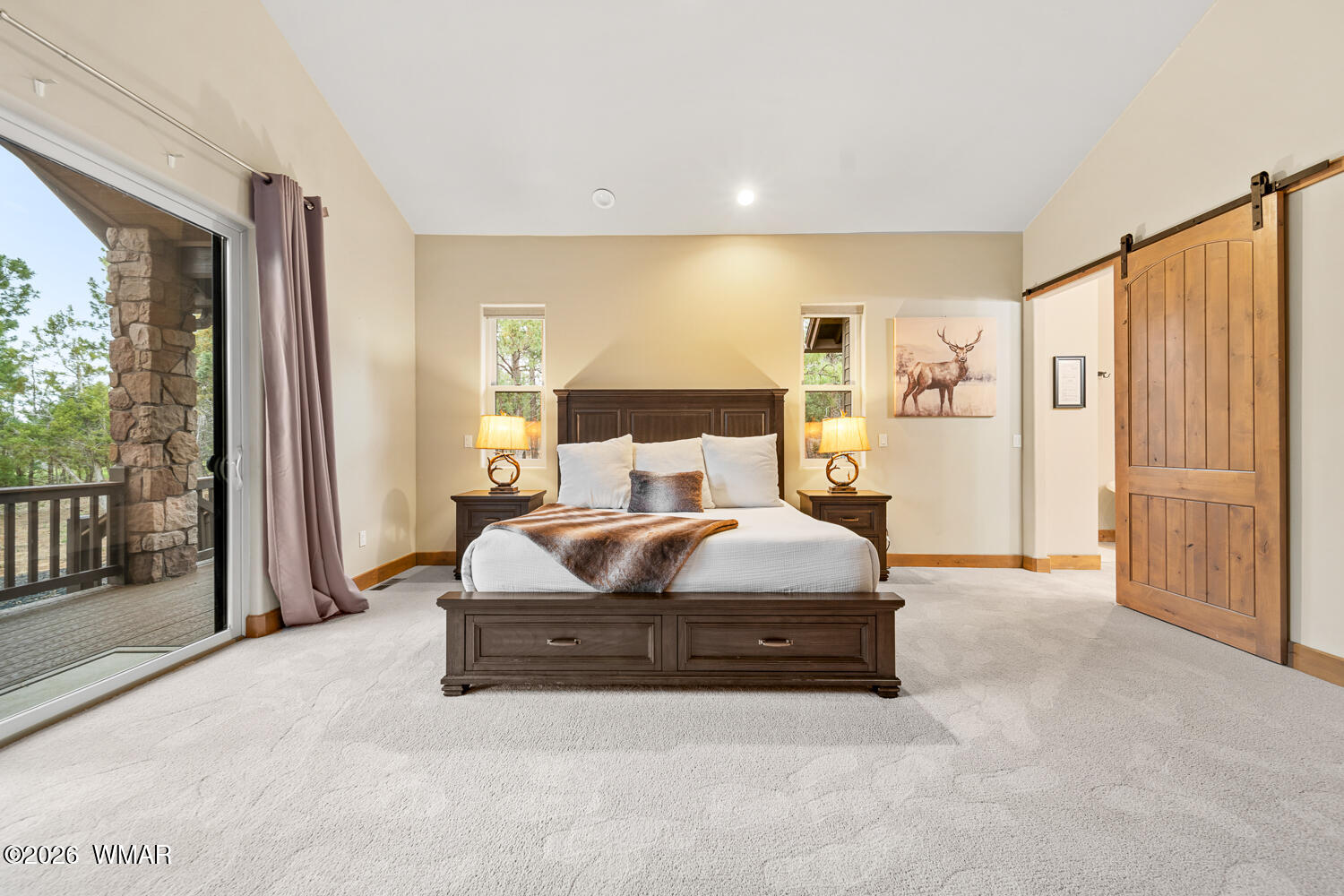 3360 West Blazingstar Road Show Low, AZ 85901 - Photo 41 of 71 a spacious bedroom with a bed and large windows
